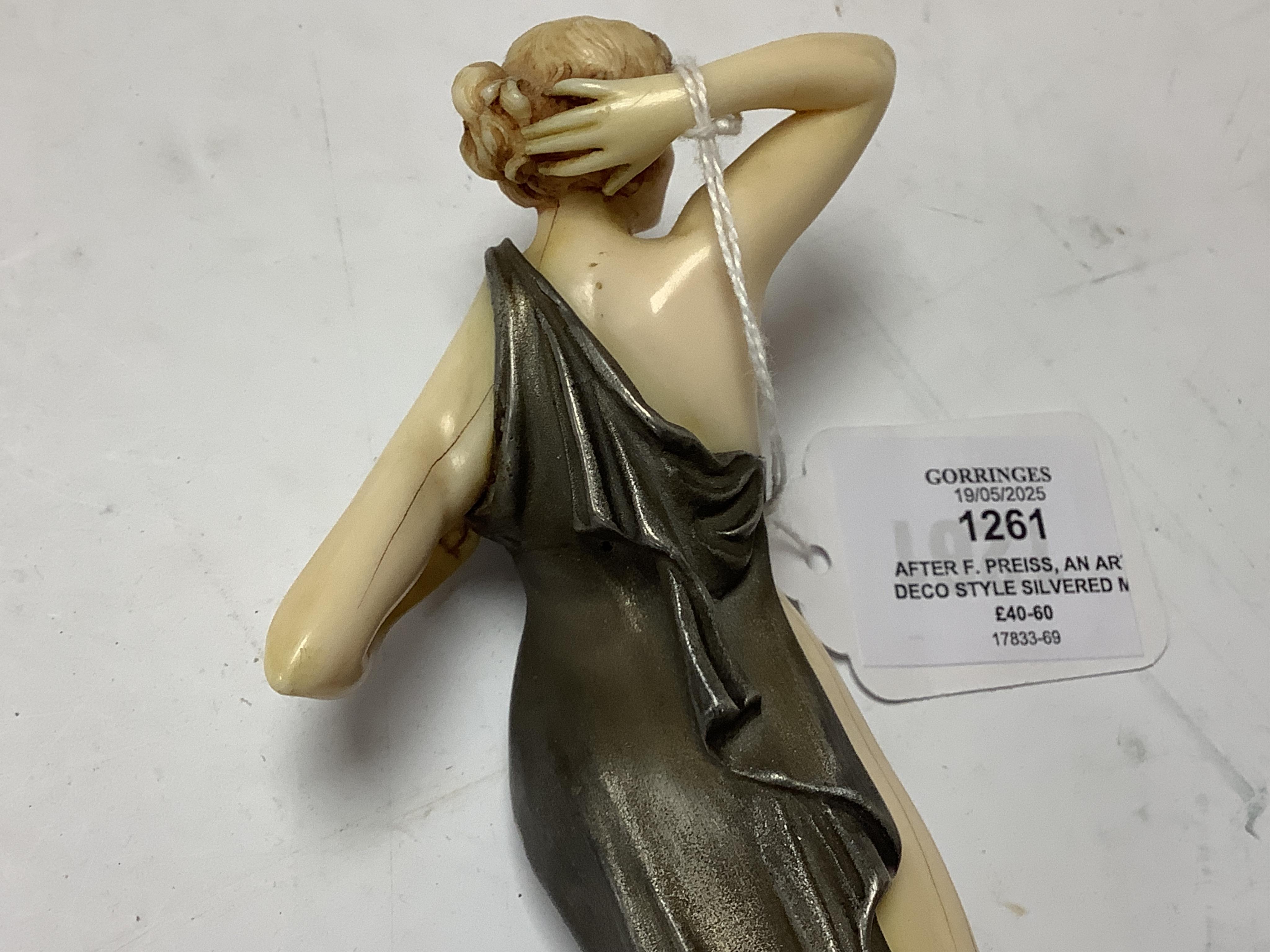 After F. Preiss, an Art Deco style silvered metal and ivorine figure, 'Vanity', 22cm high